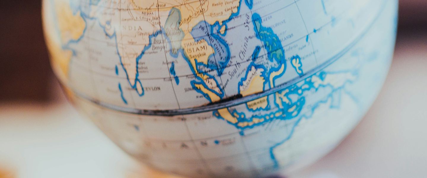 Desk globe turned to show South-East Asia, with Thailand near the centre